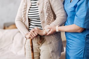 Nurse caring for elderly lady. Local PR.